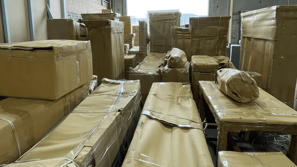 Unpacking new shipments in the rain - Few and Far