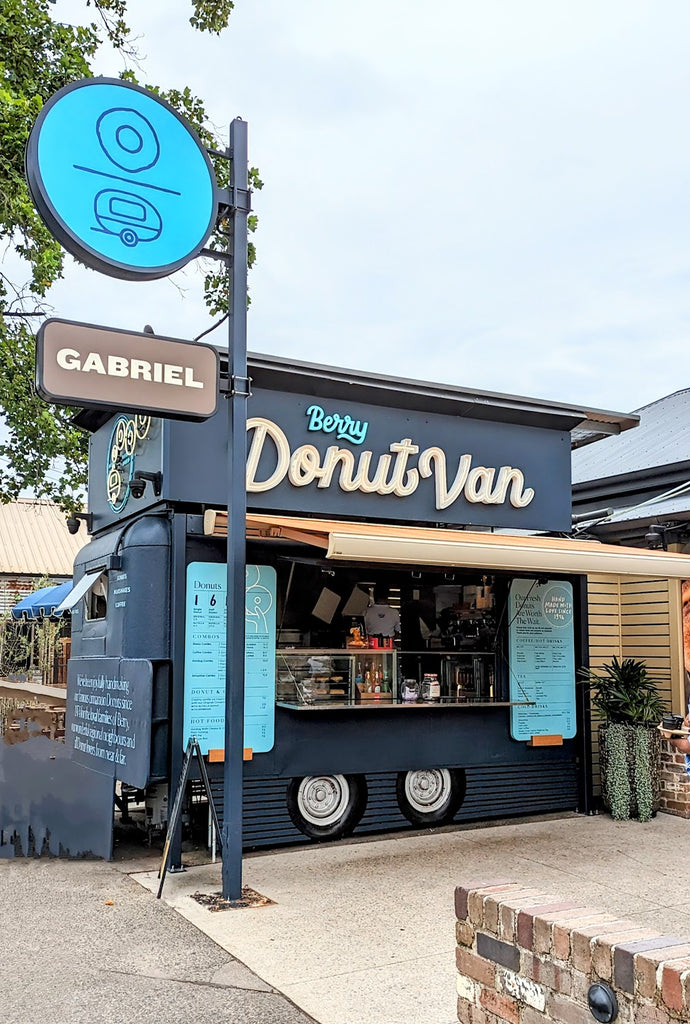 Donut Van with 'Gabriel' branding on a street corner