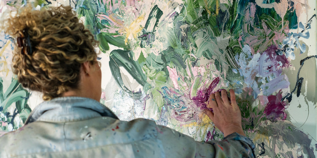 Vibrant abstract floral painting by Victoria Wilson, featuring bold colors, dynamic brushstrokes, and textured layers created with acrylic paints.