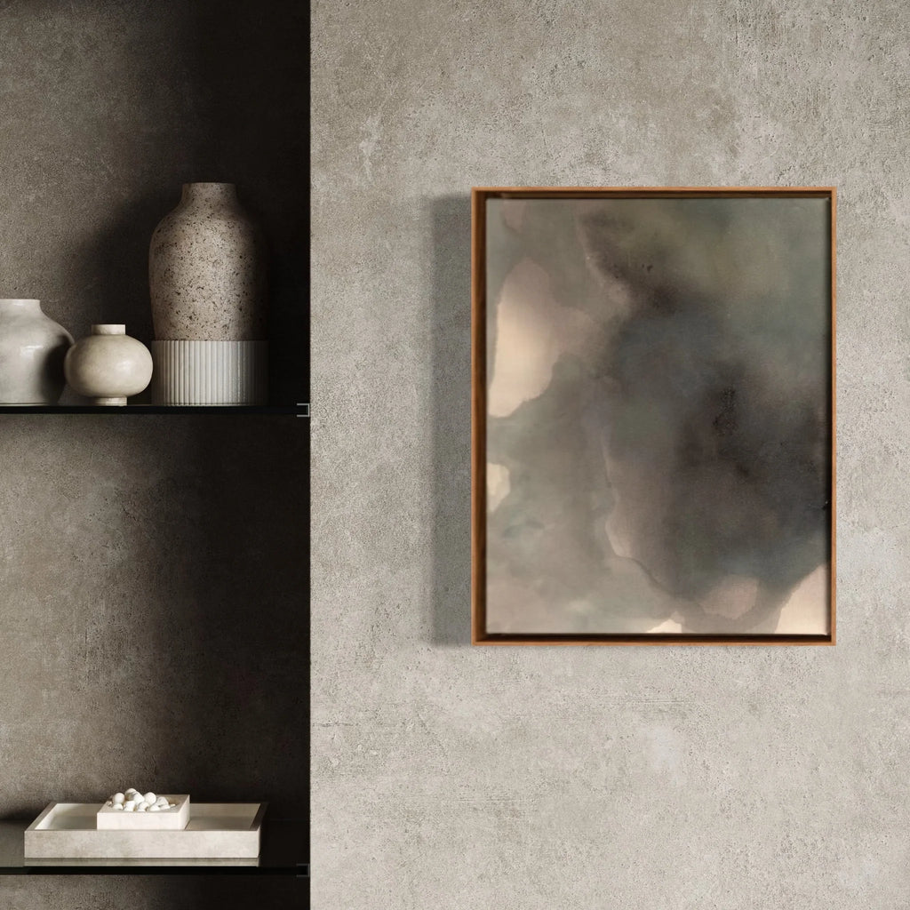 Abstract painting in a wooden frame on a gray wall with decorative vases on a shelf.
