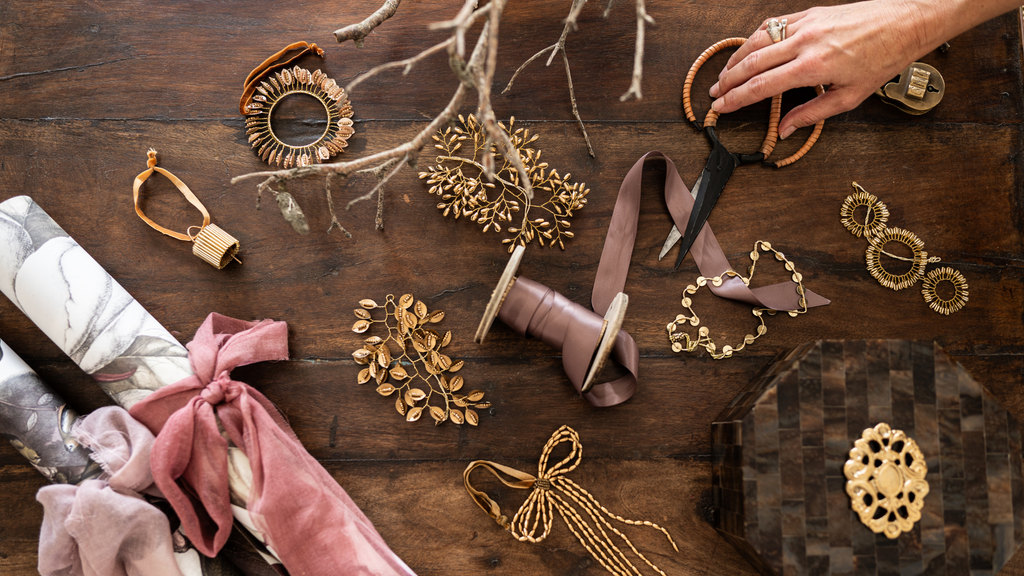 Christmas decorations on a wooden table, wrapping christmas presents.