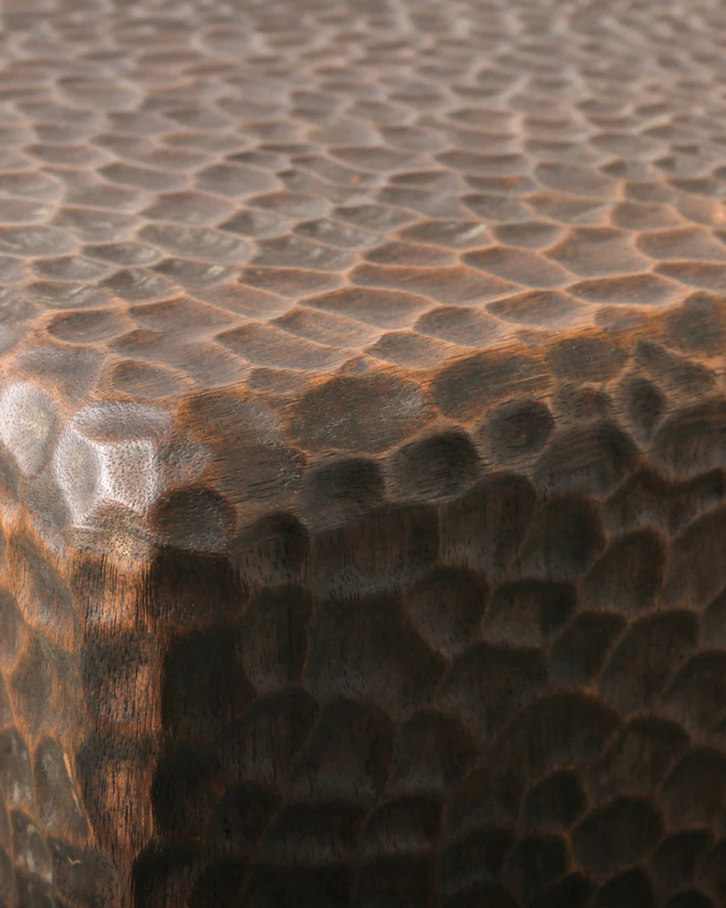 Close-up of a textured brown surface with a pattern